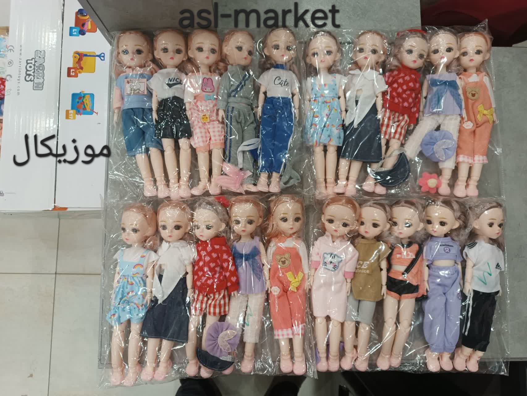 عروسک چشم تیله ای موزیکال